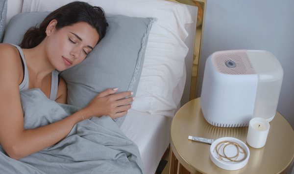 Woman Sleeping with Canopy Humidifier
