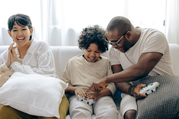 Family relaxing in comfortable room