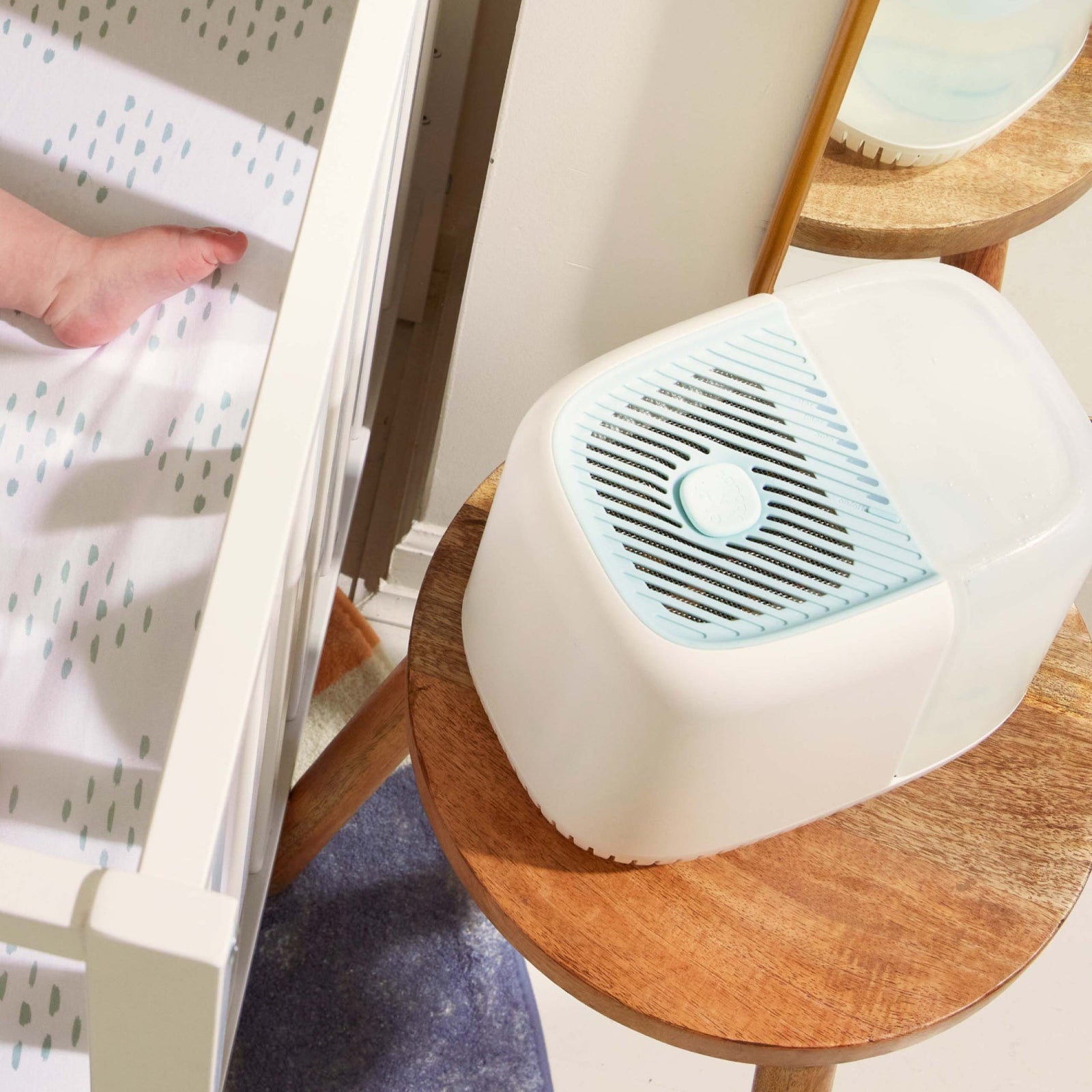 Nursery Humidifier | Lifestyle, Blue Nursery Humidifier next to a crib