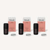 Rituals Aroma Only Subscription featuring three elegant black essential oil diffuser bottles with coral-colored boxes, including Emerald Grove, Salt Cave, and Indigo Sage scents, each paired with a signature ceramic stone diffuser by Canopy