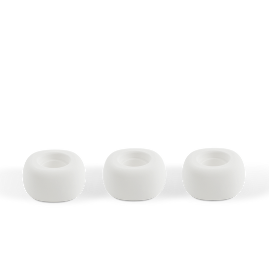 Three white ceramic Diffusion Well vessels arranged in a row against a white background, designed for long-lasting aromatherapy diffusion with the Canopy Diffuser. Diffusion Well 3-Pack by Canopy.