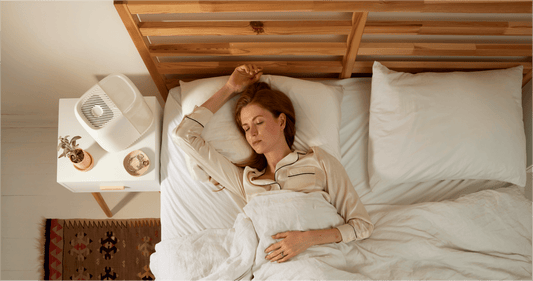 Woman sleeping with Canopy Bedside Humidifier