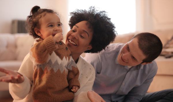 Couple with happy toddler