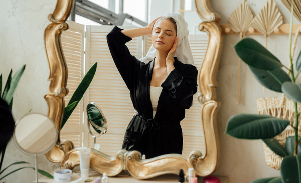 Woman relaxing in fancy bathroom