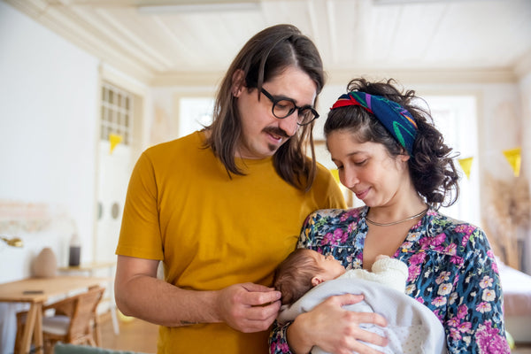 Couple with newborn baby