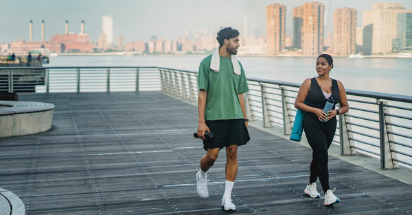 Couple walking home after working out