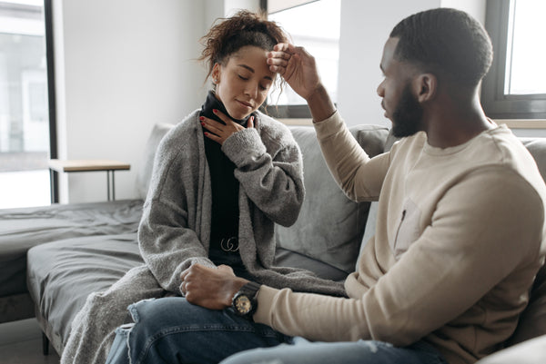 Woman feeling ill at home