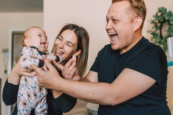 Parents taking care of baby