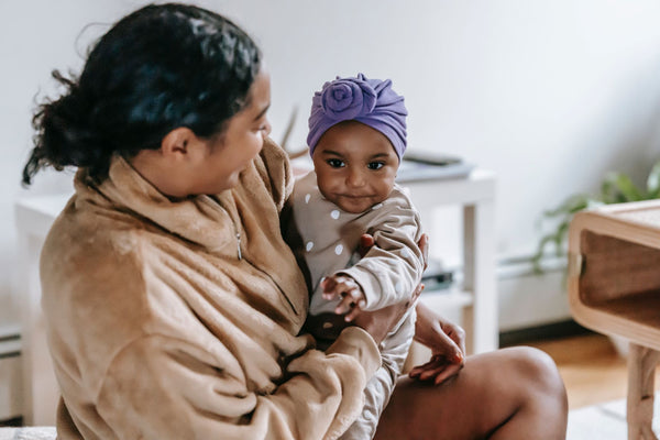 Mother and baby in comfortable room