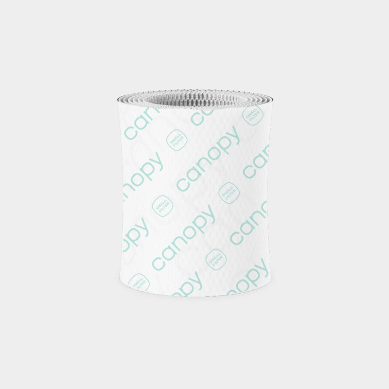 Bedside Humidifier 2.0 Device Filter Subscription - Cylindrical blue antimicrobial replacement filter with textured honeycomb pattern and Canopy logo imprint, featuring wood pulp construction for efficient water filtration and evaporation