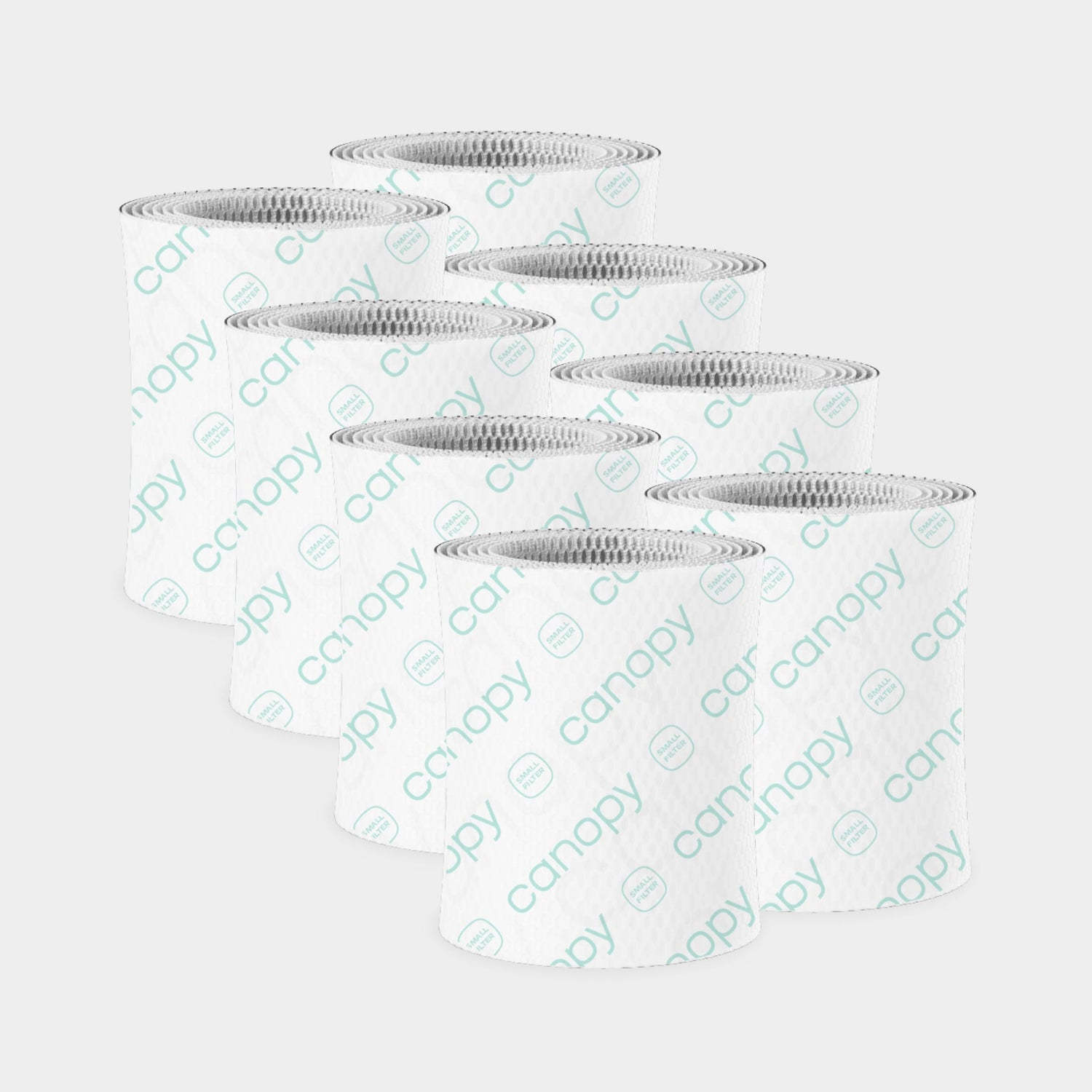 Bedside Humidifier Filter 2.0 Bundle featuring eight cylindrical blue paper-based filters with textured honeycomb pattern and white trim, arranged in two rows showing their antimicrobial design for optimal air purification
