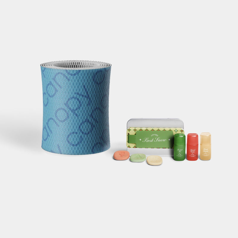 Bedside Humidifier Device Filter 2.0 & Aroma set featuring a blue textured filter roll alongside three Sanctuary aromatherapy bottles with mint-colored packaging boxes, arranged against a white background for optimal air purification and fragrance diffusion