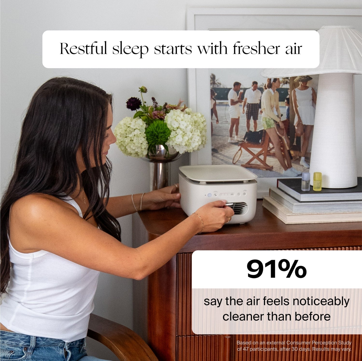 Clara Peirce x Canopy Air Purifier | Lifestyle, restful sleep starts with fresher air; 91% say the air feels noticeably cleaner than before; Woman using an air purifier with text about restful sleep and cleaner air
