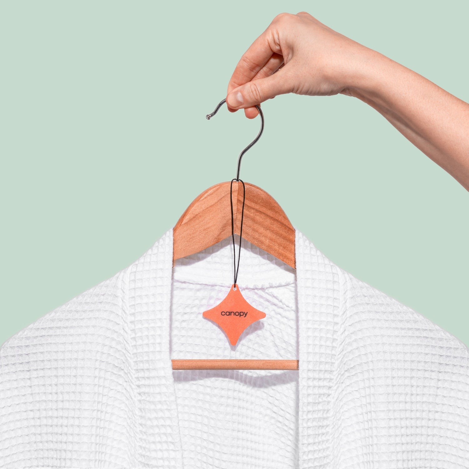 On-The-Go Felt Diffusers | Felt Diffuser attached to a clothing hanger